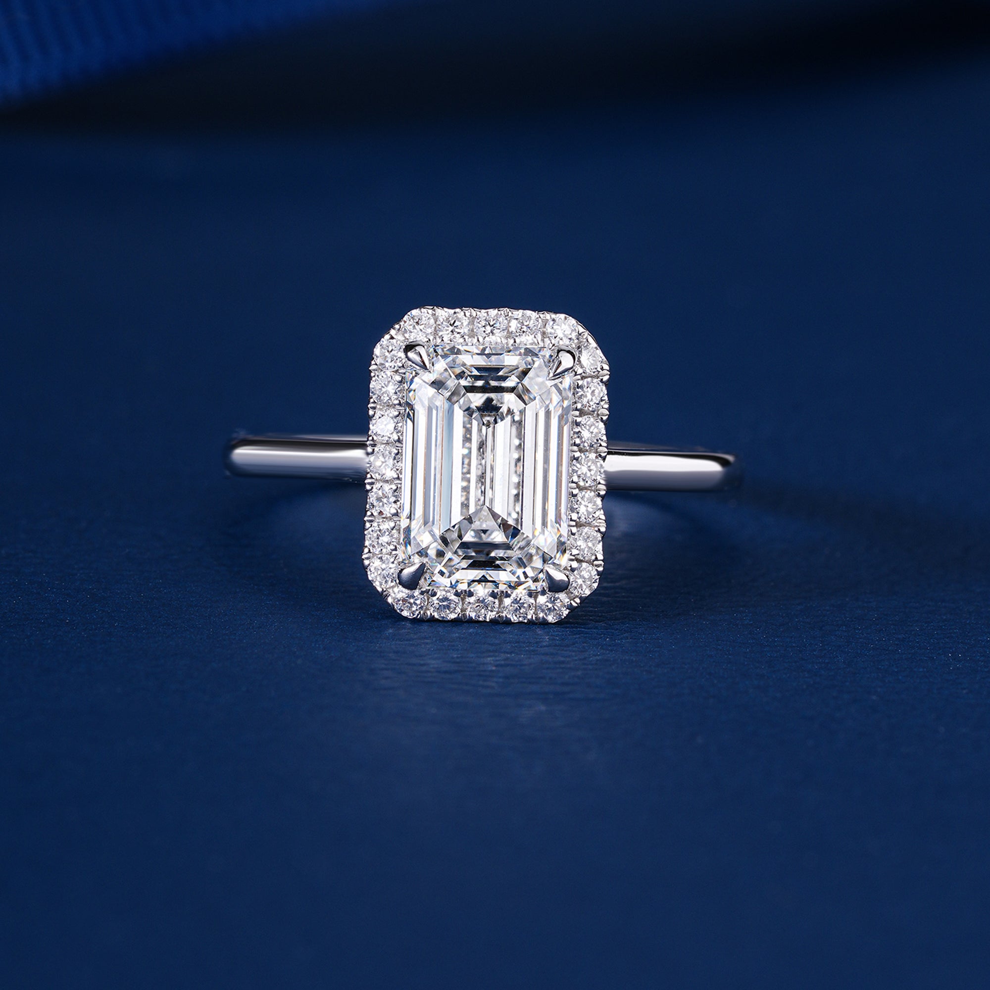 2.10 CT Emerald Cut Lab Grown Diamond Bridge Halo Set Solitaire Engagement Ring