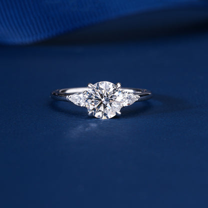 1.00 CT Round Diamond Three-Stone Ring with Pear Side Stones