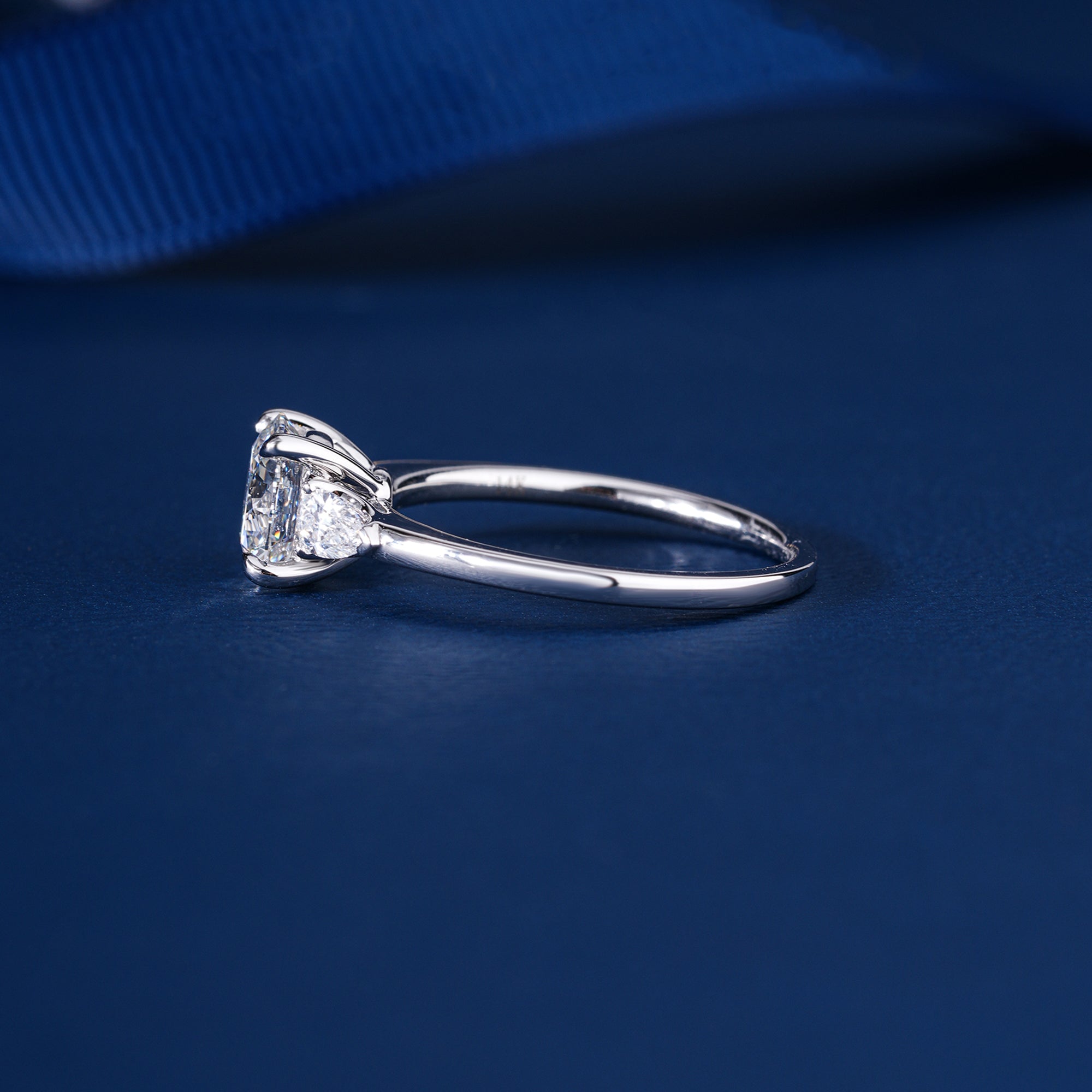 1.00 CT Round Diamond Three-Stone Ring with Pear Side Stones