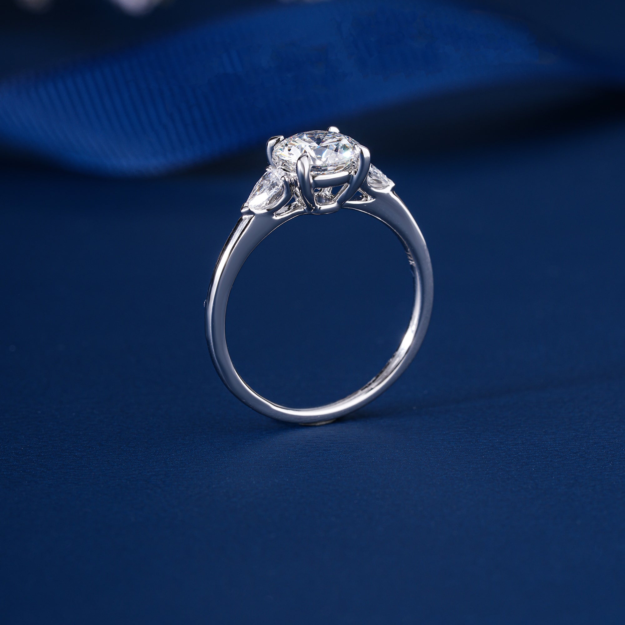 1.00 CT Round Diamond Three-Stone Ring with Pear Side Stones