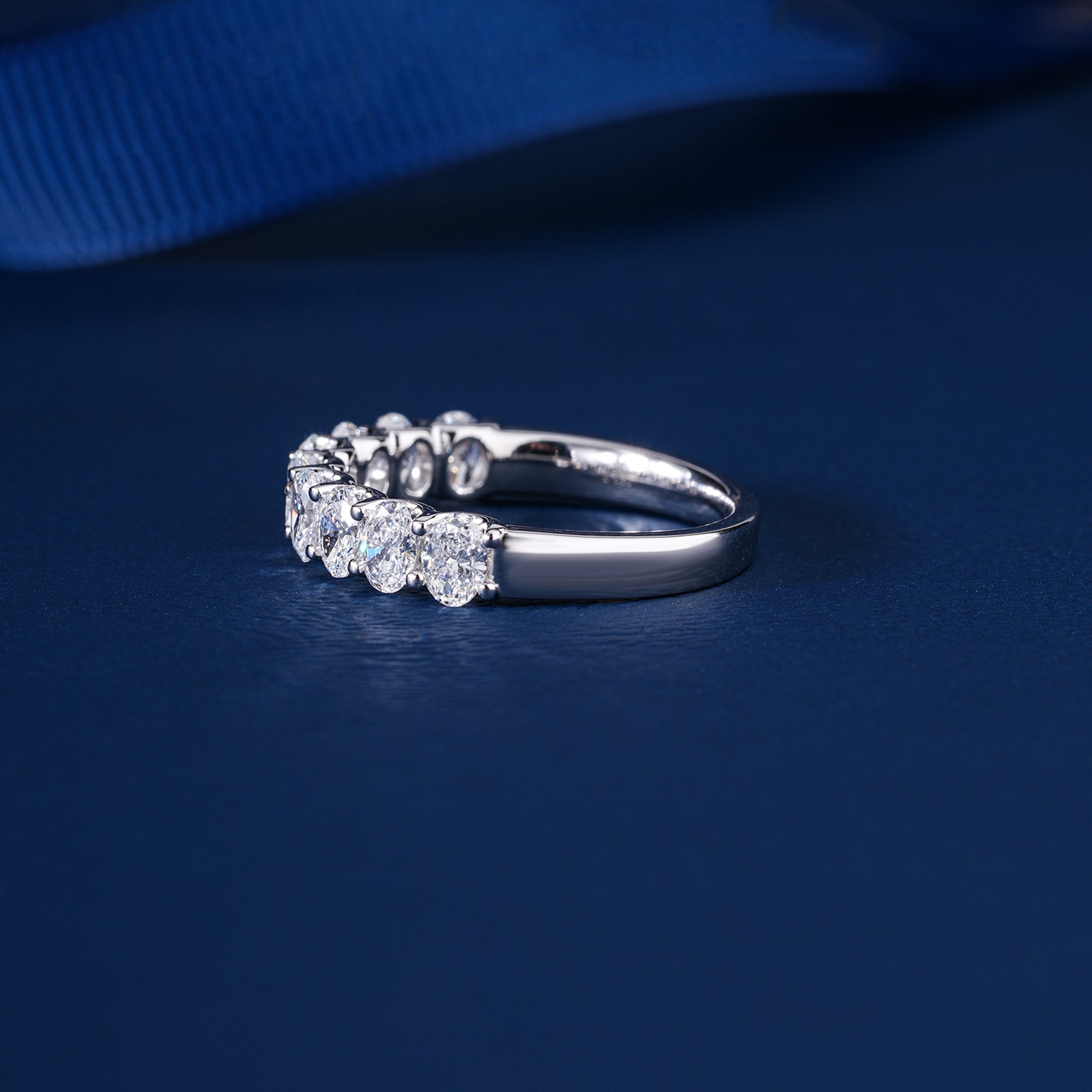 0.70 TCW Oval Cut Lab Grown Diamond Delicate Wedding Band