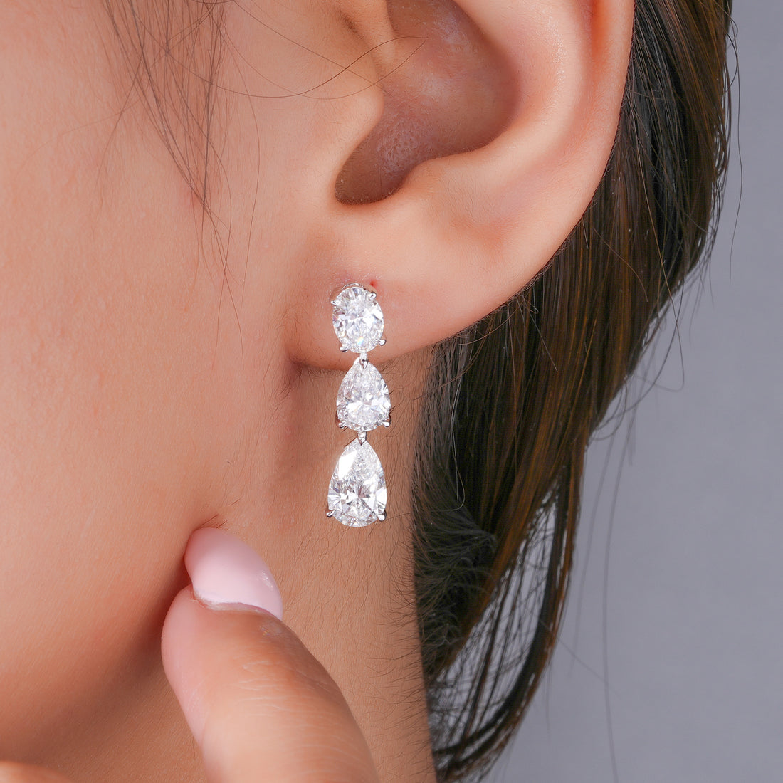 4.80 TCW Pear and Oval Cut Lab Grown Diamond Dangle Earrings