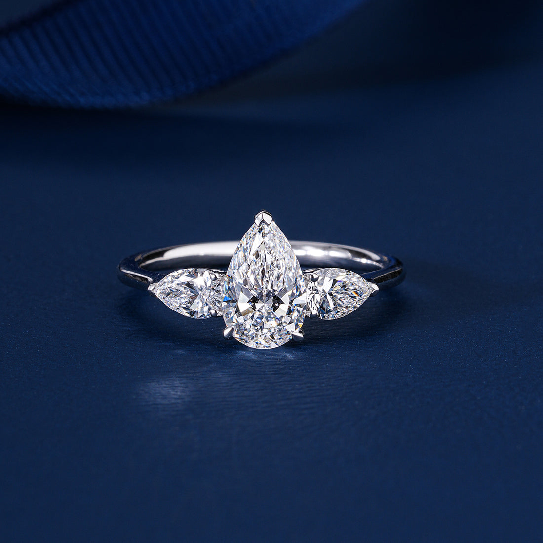 1.1 Carat Pear (Teardrop) Three Stone Pave Setting Luxury Engagement Ring