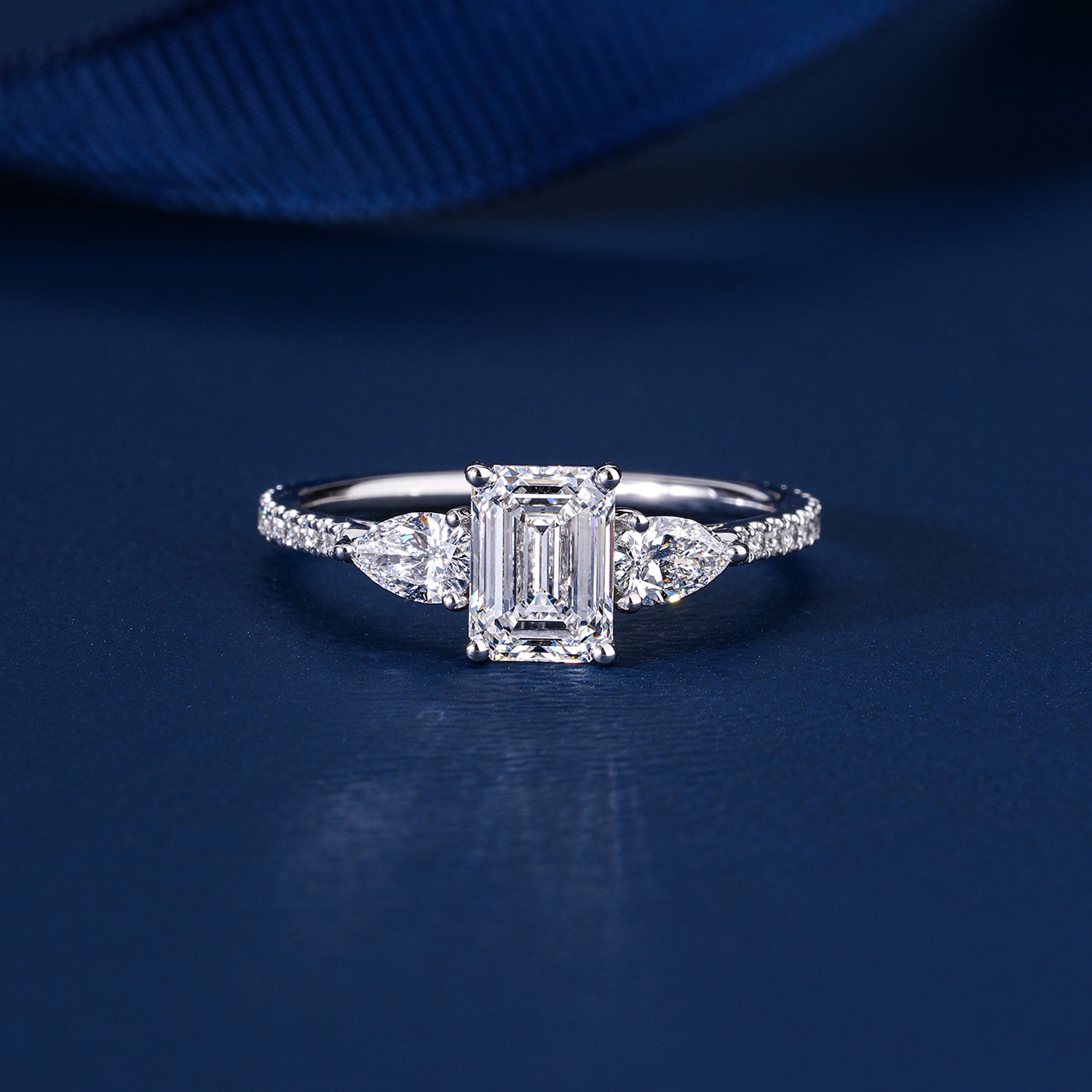 1.00 CT Emerald Cut Lab Grown Diamond Pear Side Trilogy Unique Engagement Ring
