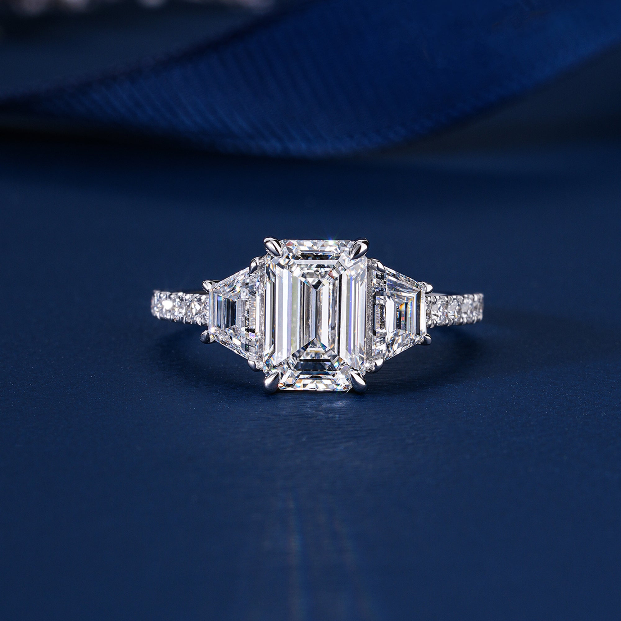 2.10 CT Emerald Cut Lab Grown Diamond Trilogy Geometric Setting Engagement Ring