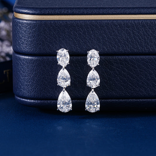4.80 TCW Pear and Oval Cut Lab Grown Diamond Dangle Earrings