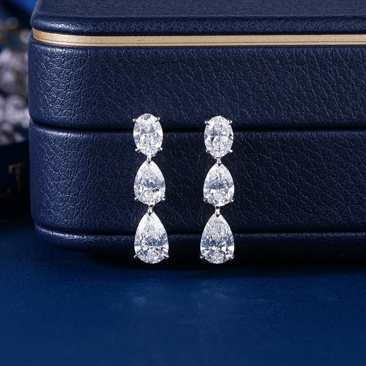 4.80 TCW Pear and Oval Cut Lab Grown Diamond Dangle Earrings