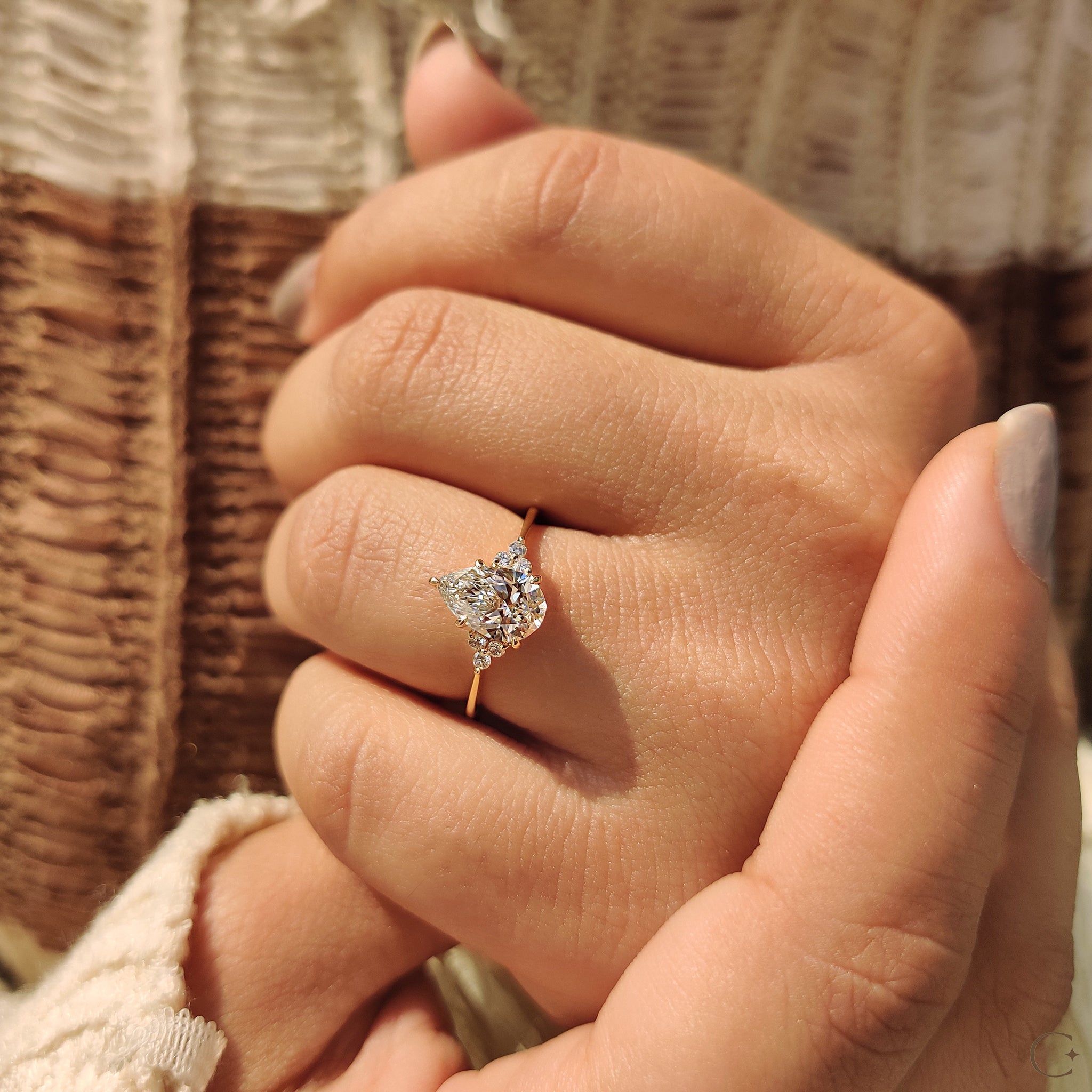 Pear Cut Engagement Ring In Muse Setting