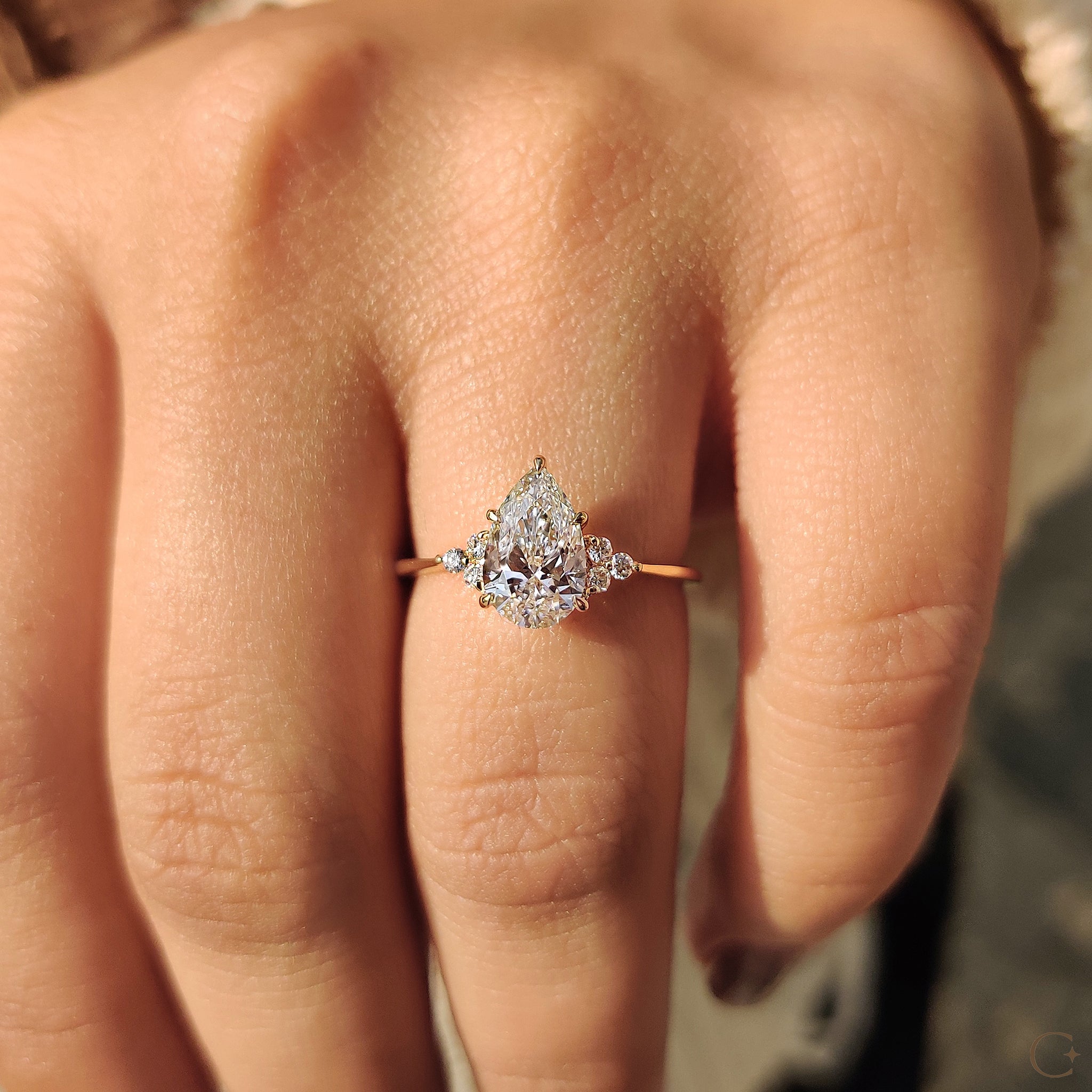 Pear Cut Engagement Ring In Muse Setting