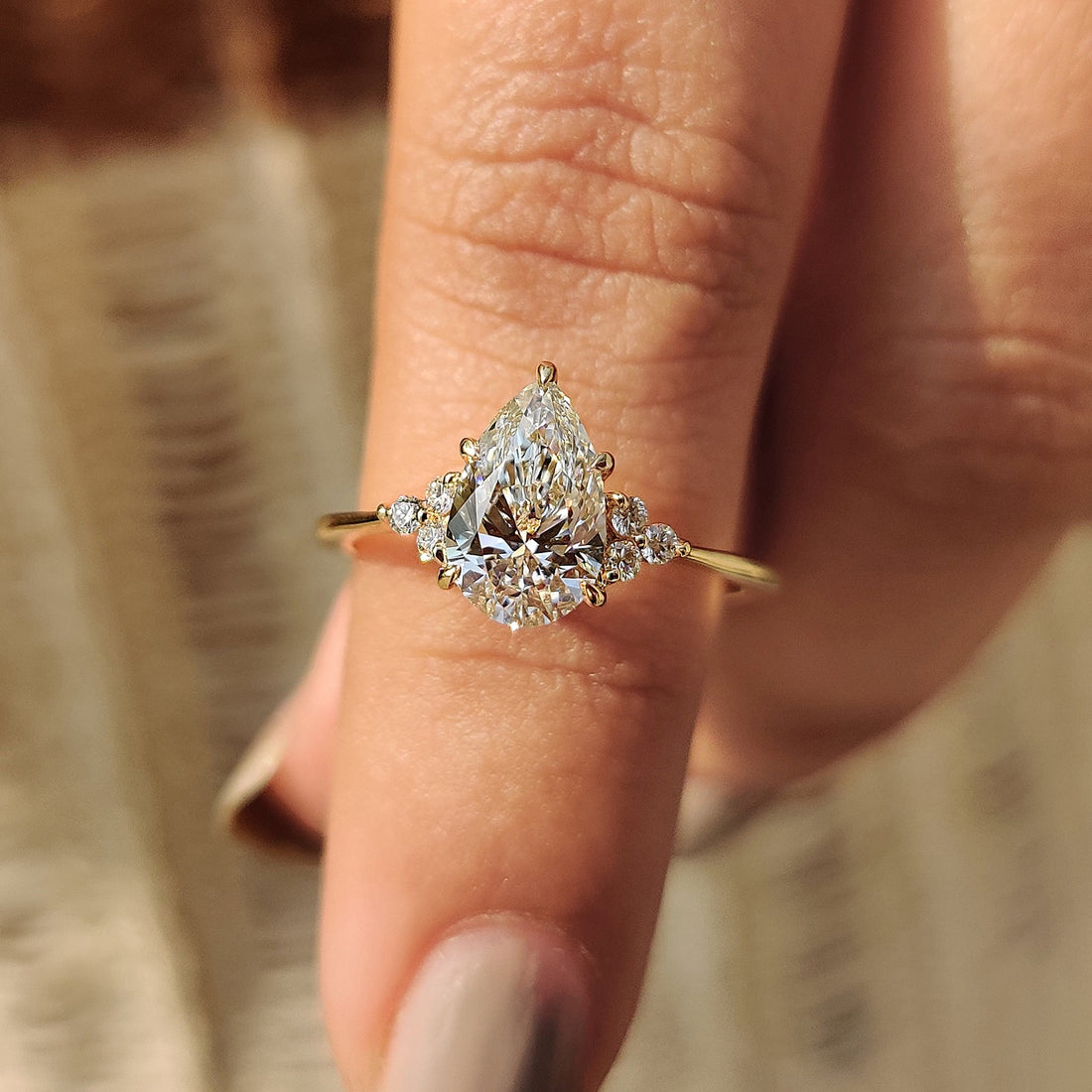 Pear Cut Engagement Ring In Muse Setting