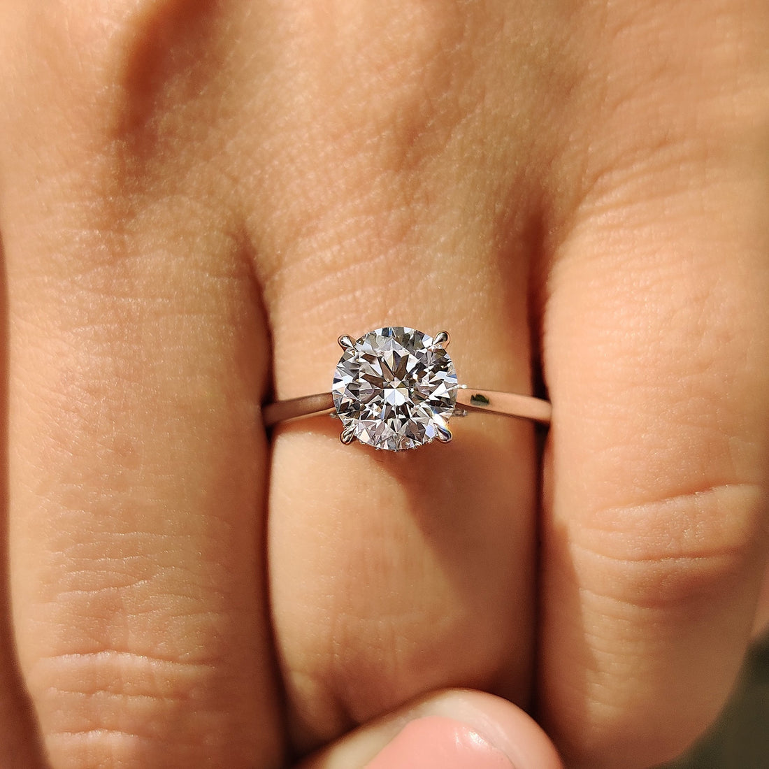 Round Cut Diamond Ring With Cathedral Setting